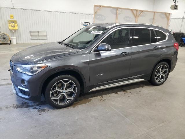BMW X1 XDRIVE2 2018 with VIN WBXHT3C37J5K23709 - Photo from auction