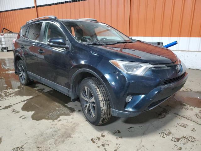Photo 4 from auction – 2017 TOYOTA RAV4 XLE with VIN 2T3RFREV7HW639787