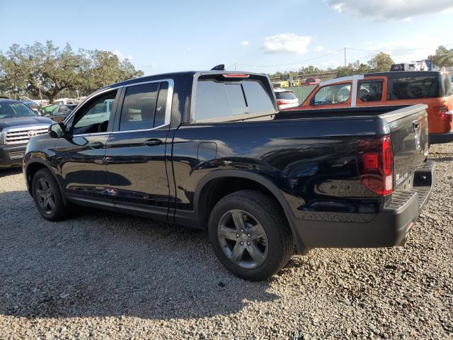 Photo 2 from auction – 2023 HONDA RIDGELINE with VIN 5FPYK3F56PB034013