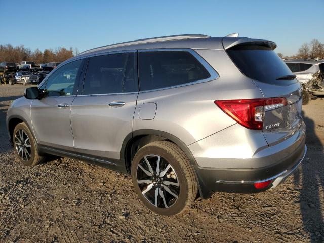 Photo 2 from auction – 2022 HONDA PILOT TOUR with VIN 5FNYF6H91NB010147