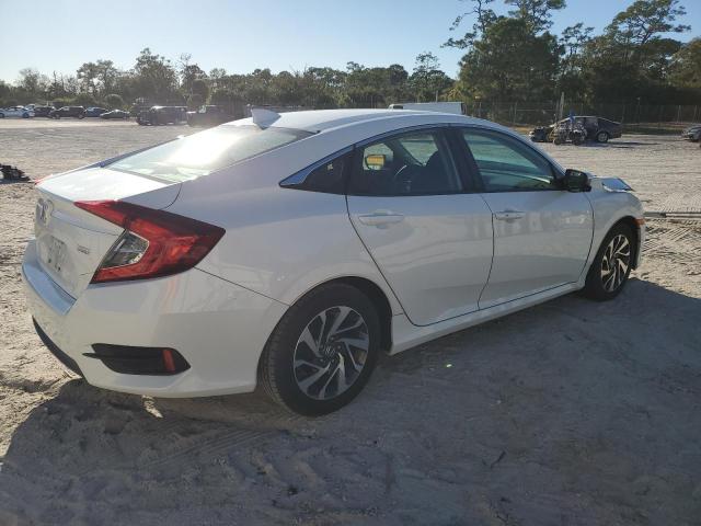 Photo 3 from auction – 2018 HONDA CIVIC EX with VIN 19XFC2F77JE002161