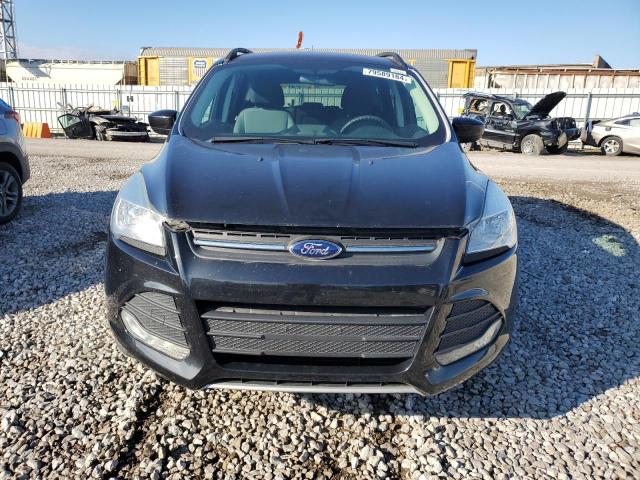 Photo 5 from auction – 2015 FORD ESCAPE SE with VIN 1FMCU9GX4FUA76133