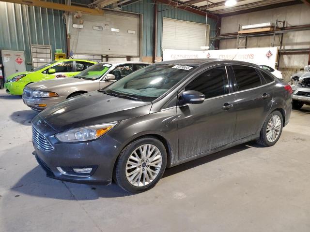 FORD FOCUS TITA 2017 with VIN 1FADP3J27HL308121 - Photo from auction
