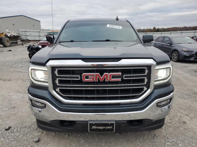 Photo 5 from auction – 2018 GMC SIERRA K15 with VIN 3GTU2MEC8JG252761