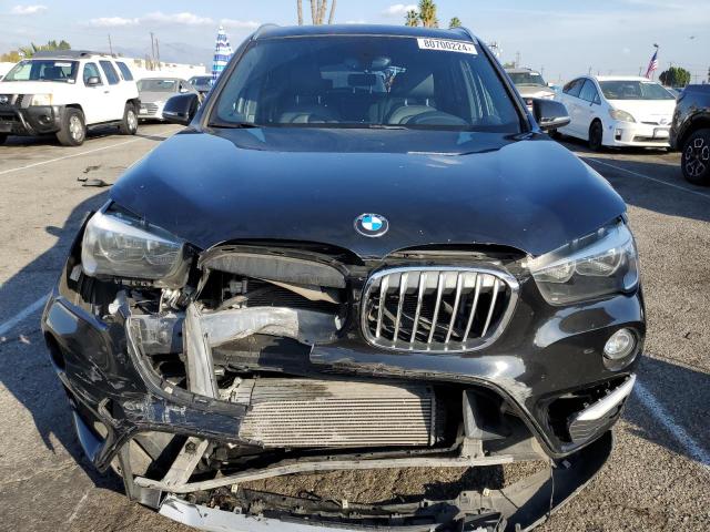 Photo 5 from auction – 2018 BMW X1 XDRIVE2 with VIN WBXHT3Z30J4A66587