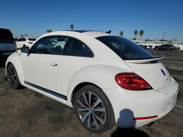 Photo 2 from auction – 2013 VOLKSWAGEN BEETLE TUR with VIN 3VWVA7AT6DM606777