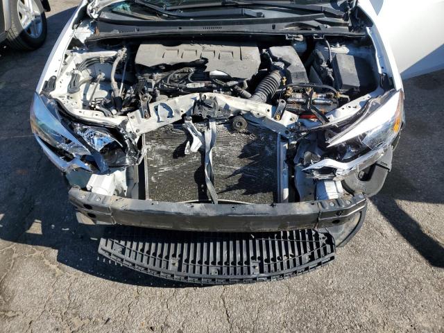 Photo 11 from auction – 2014 TOYOTA COROLLA L with VIN 2T1BURHE8EC004599