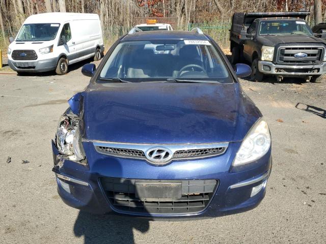 Photo 5 from auction – 2011 HYUNDAI ELANTRA TO with VIN KMHDC8AE4BU091122