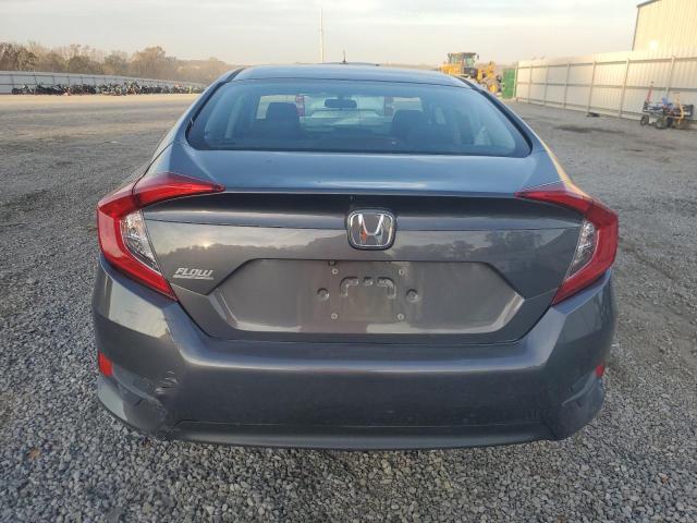 Photo 6 from auction – 2016 HONDA CIVIC LX with VIN 2HGFC2F50GH554033