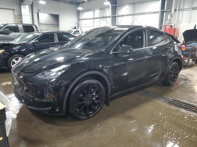 TESLA MODEL Y 2023 with VIN 7SAYGDEE8PA124104 - Photo from auction