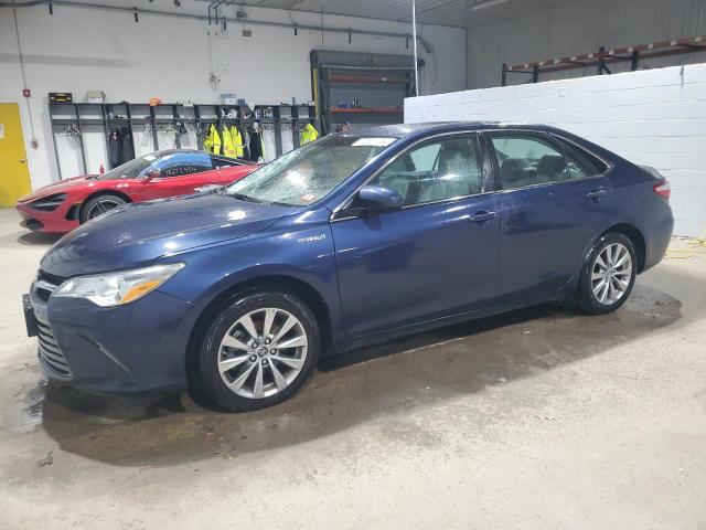 TOYOTA CAMRY HYBR 2015 with VIN 4T1BD1FK3FU158728 - Photo from auction
