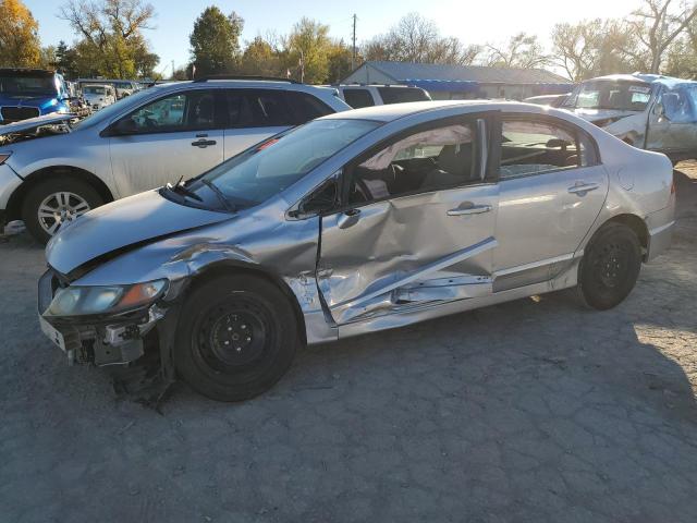 HONDA CIVIC LX 2011 with VIN 2HGFA1F50BH304638 - Photo from auction