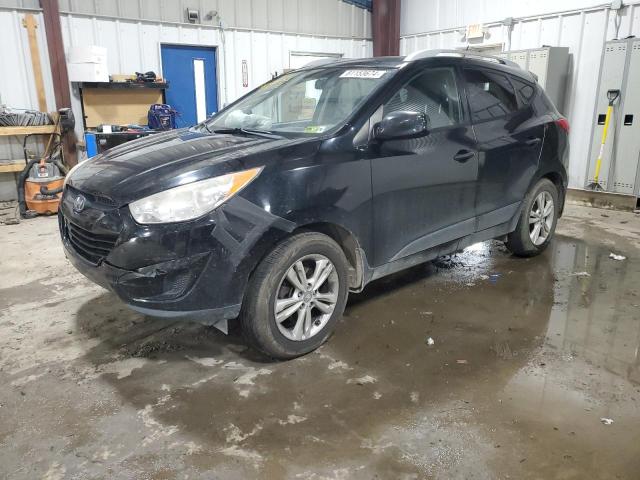 HYUNDAI TUCSON GLS 2011 with VIN KM8JUCAC7BU184170 - Photo from auction