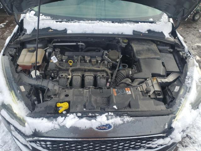 Photo 12 from auction – 2015 FORD FOCUS SE with VIN 1FADP3F20FL293872