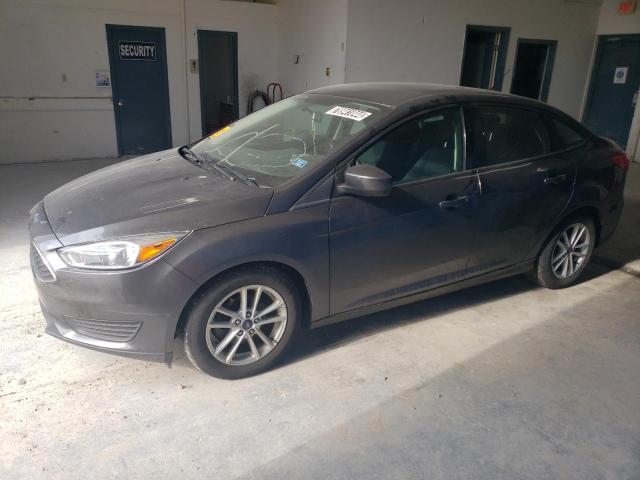 FORD FOCUS SE 2018 с VIN 1FADP3FEXJL209978 - Снимка от търг