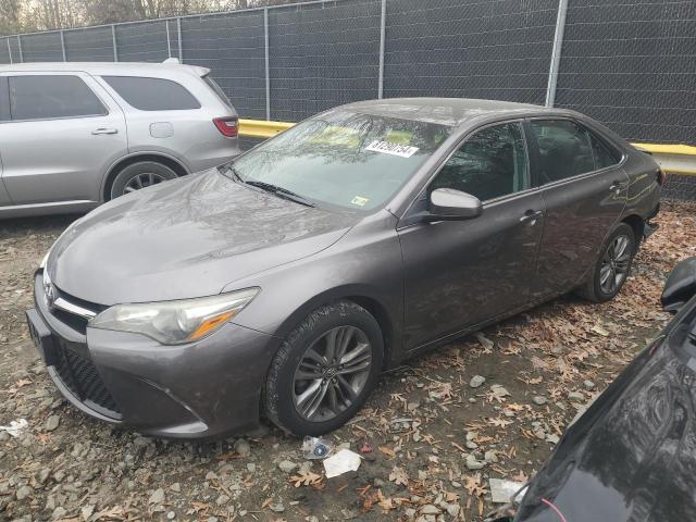 TOYOTA CAMRY LE 2017 with VIN 4T1BF1FK6HU694019 - Photo from auction