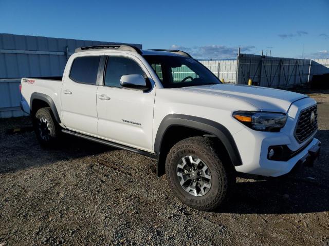 Photo 4 from auction – 2023 TOYOTA TACOMA DOU with VIN 3TYCZ5AN8PT123700