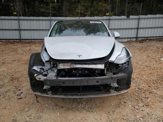 Photo 5 from auction – 2022 TESLA MODEL Y with VIN 7SAYGDEE8NF316106