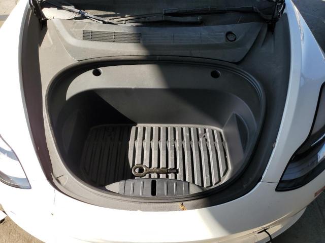 Photo 11 from auction – 2023 TESLA MODEL 3 with VIN 5YJ3E1EA3PF404105