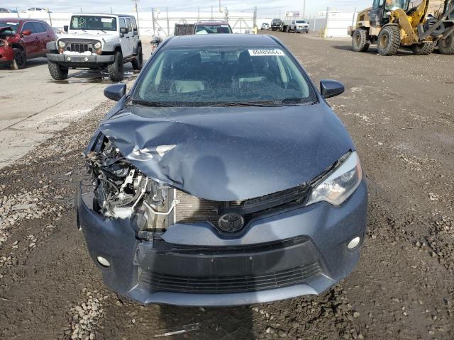 Photo 5 from auction – 2014 TOYOTA COROLLA EC with VIN 5YFBPRHE0EP158344
