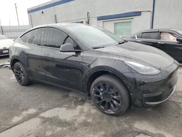 Photo 4 from auction – 2024 TESLA MODEL Y with VIN 7SAYGDEE2RA220295