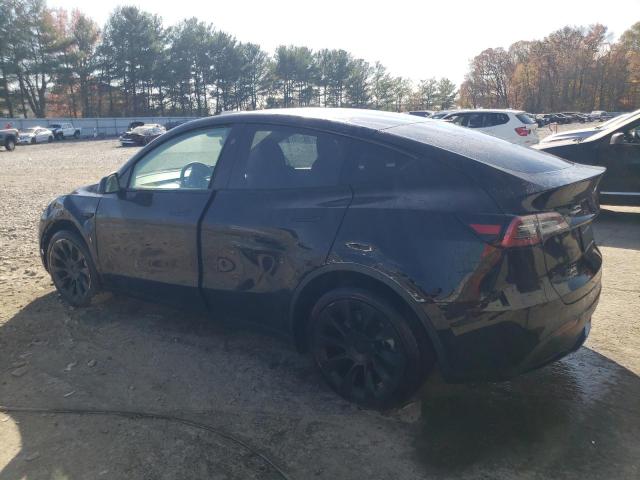 Photo 2 from auction – 2023 TESLA MODEL Y with VIN 7SAYGDEE3PF889997