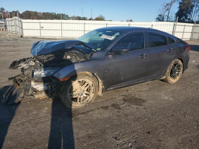 HONDA CIVIC EX 2018 with VIN 2HGFC2F77JH575678 - Photo from auction
