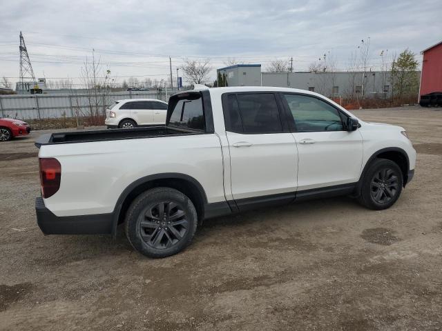 Photo 3 from auction – 2021 HONDA RIDGELINE with VIN 5FPYK3F10MB501662