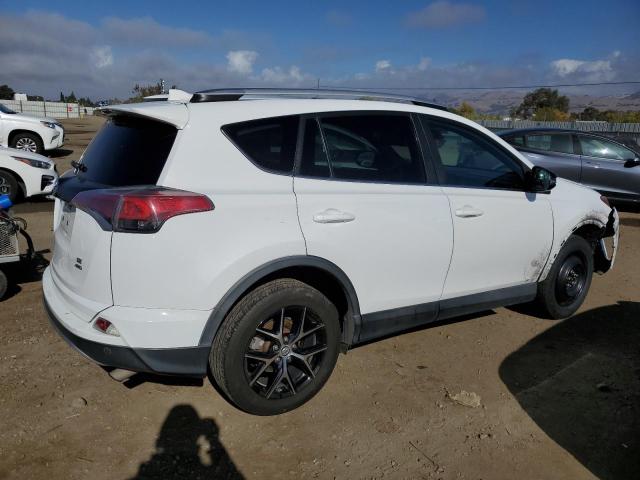 Photo 3 from auction – 2016 TOYOTA RAV4 SE with VIN 2T3JFREV7GW536459