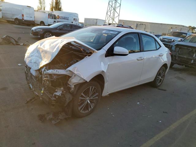 TOYOTA COROLLA L 2017 with VIN 5YFBURHE9HP659259 - Photo from auction
