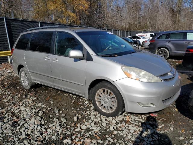 Photo 4 from auction – 2010 TOYOTA SIENNA XLE with VIN 5TDYK4CC3AS329381