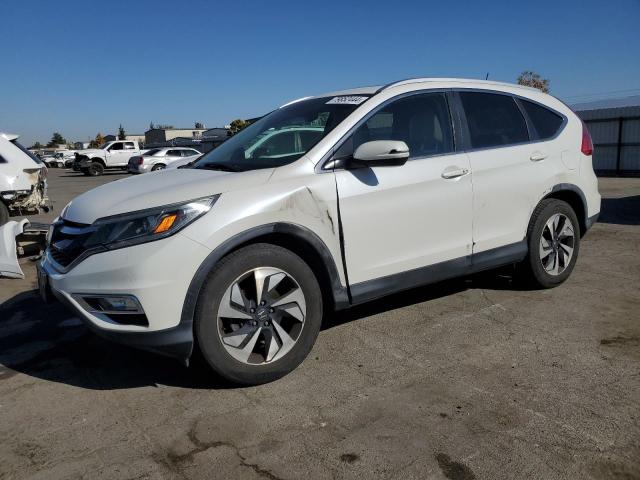 Photo 1 from auction – 2015 HONDA CR-V TOURI with VIN 5J6RM3H92FL006240