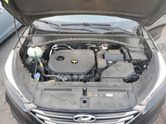 Photo 12 from auction – 2018 HYUNDAI TUCSON SE with VIN KM8J2CA4XJU710532