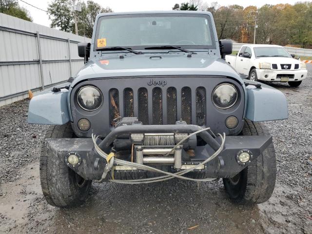 Photo 5 from auction – 2014 JEEP WRANGLER U with VIN 1C4BJWEG4EL226420