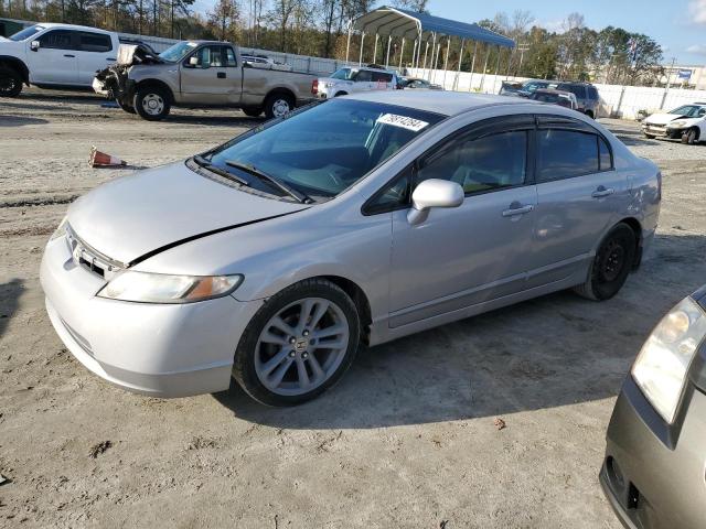 HONDA CIVIC LX 2010 with VIN 2HGFA1E59AH566402 - Photo from auction