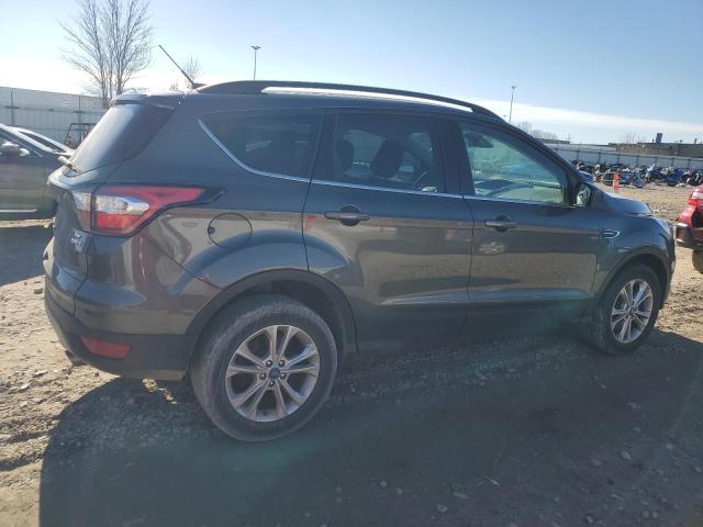 Photo 3 from auction – 2018 FORD ESCAPE SE with VIN 1FMCU9GD6JUC63078