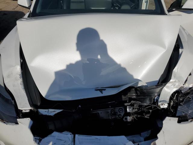 Снимка 11 от търг – 2022 TESLA MODEL 3 с VIN 5YJ3E1EB6NF103964