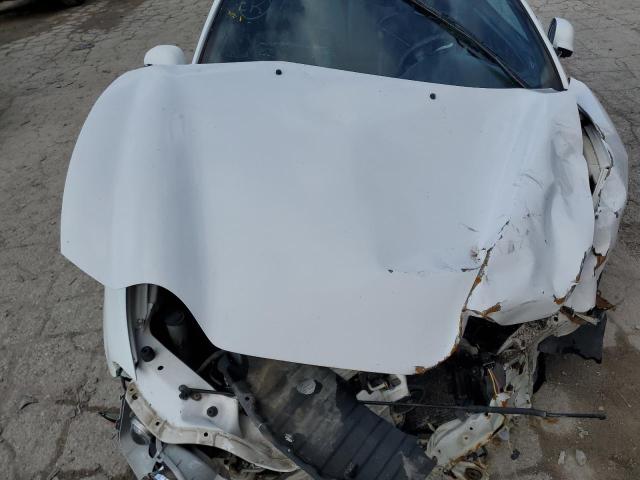 Photo 11 from auction – 2000 HYUNDAI TIBURON with VIN KMHJG35F9YU191917