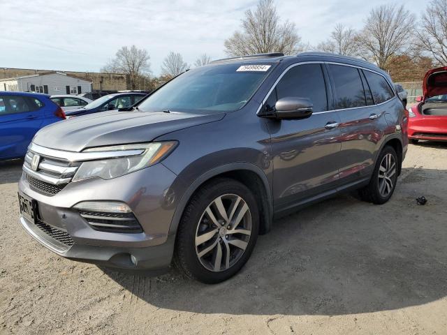 Photo 1 from auction – 2016 HONDA PILOT TOUR with VIN 5FNYF5H90GB008046