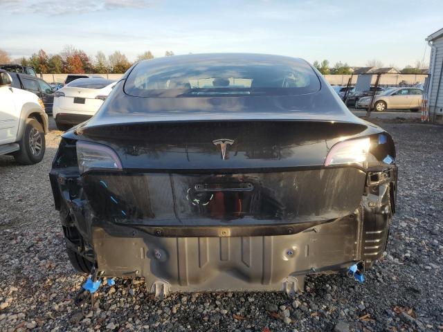 Photo 6 from auction – 2021 TESLA MODEL 3 with VIN 5YJ3E1EA7MF977634