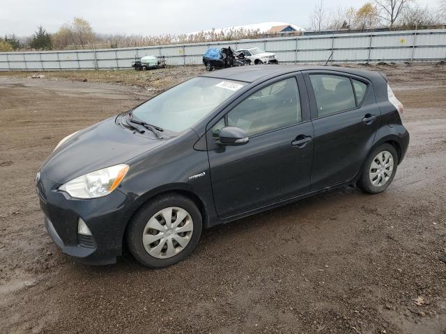 TOYOTA PRIUS C 2014 with VIN JTDKDTB36E1559494 - Photo from auction