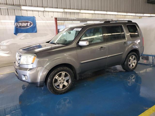 HONDA PILOT TOUR 2011 с VIN 5FNYF4H93BB070236 - Фото с аукциона