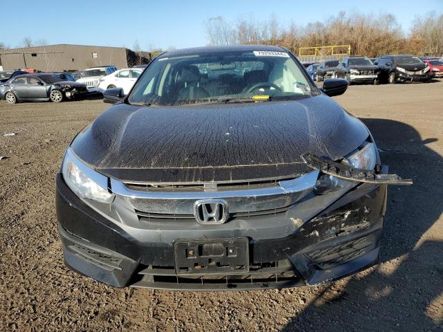 Photo 5 from auction – 2018 HONDA CIVIC EX with VIN 2HGFC2F74JH528012