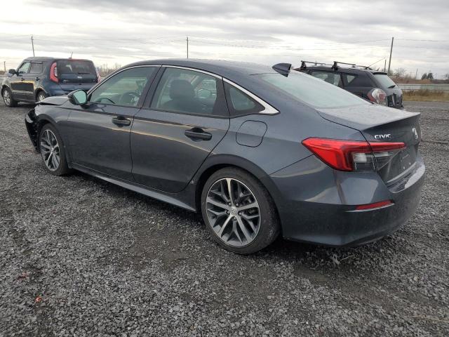 Photo 2 from auction – 2023 HONDA CIVIC TOUR with VIN 2HGFE1F91PH002046