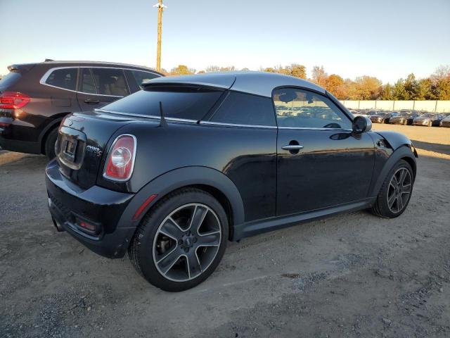 Photo 3 from auction – 2013 MINI COOPER COU with VIN WMWSX3C53DT466665