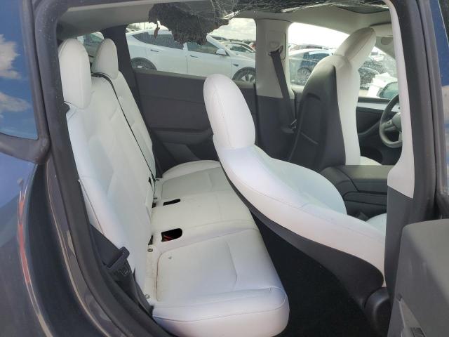 Photo 11 from auction – 2023 TESLA MODEL Y with VIN 7SAYGDEE1PF606044