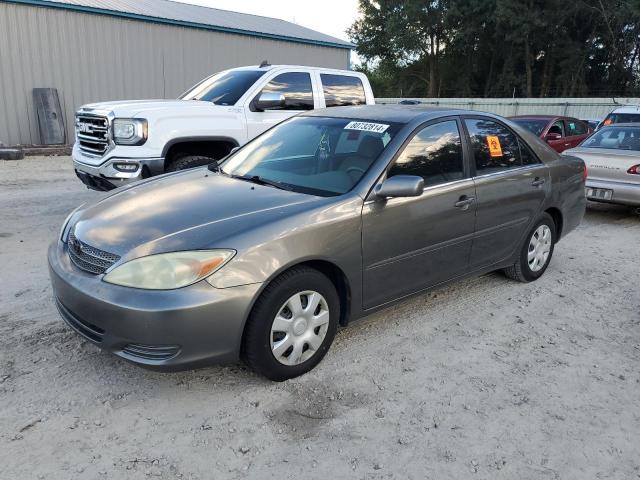 TOYOTA CAMRY LE 2003 with VIN 4T1BE32K33U779977 - Photo from auction