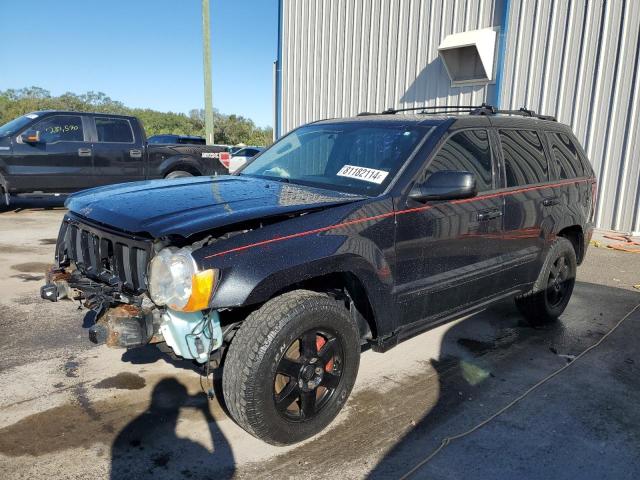 JEEP GRAND CHER 2009 with VIN 1J8GS48K89C511563 - Photo from auction