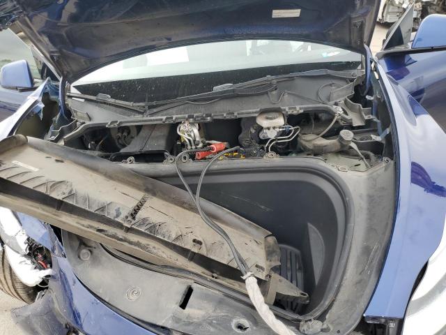Снимка 11 от търг – 2022 TESLA MODEL Y с VIN 7SAYGAEE1NF349947