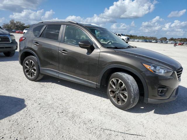 Photo 4 from auction – 2016 MAZDA CX-5 GT with VIN JM3KE2DY5G0888171